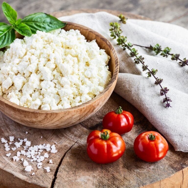 Square image of a bowl of ricotta cheese.