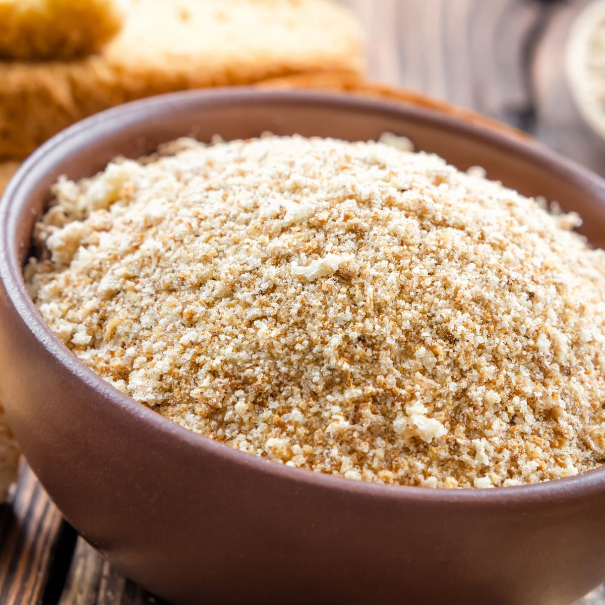 Breadcrumbs in a wooden bowl.